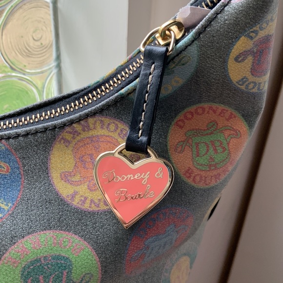 Authentic Dooney and Bourke wax coated handbag with adjustable leather strap - Picture 3 of 16